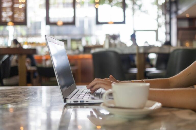 Digital nomad reviewing visa documents during an online medical consultation for Spain